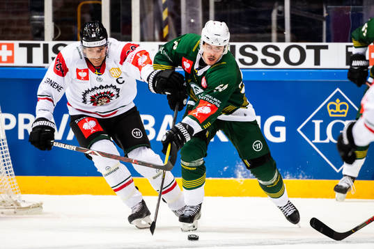 Joel Lundqvist of Frölunda and Sebastian Erixon of