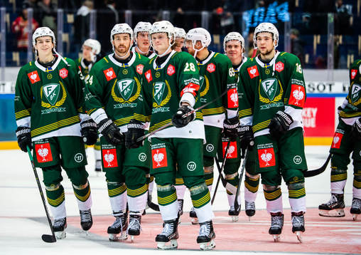 Players of Färjestad celebrate