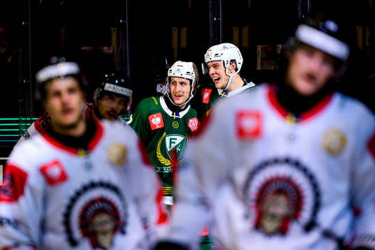 Per Åslund and Victor Ejdsell of Färjestad celebrate
