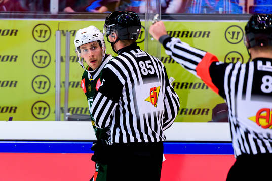 Per Åslund of Färjestad looks at the referee