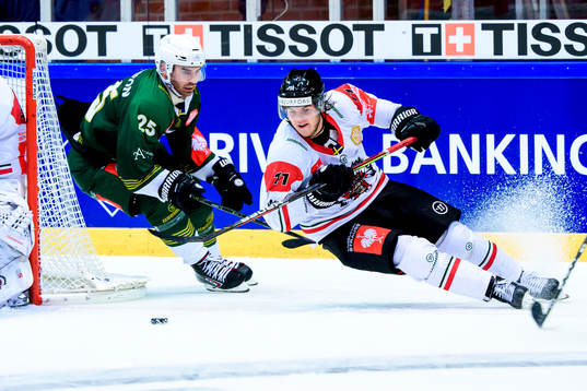 Martin Johansson of Färjestad and Samuel Fagemo of