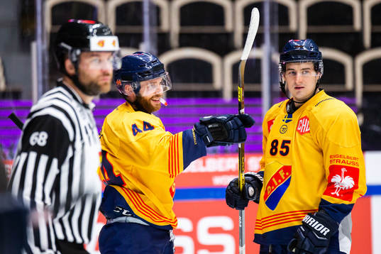 Mattias Guter and Michael Haga of Djurgården celebrate