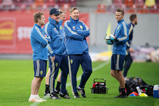 Performance manager Paul Balsom, head coach Janne