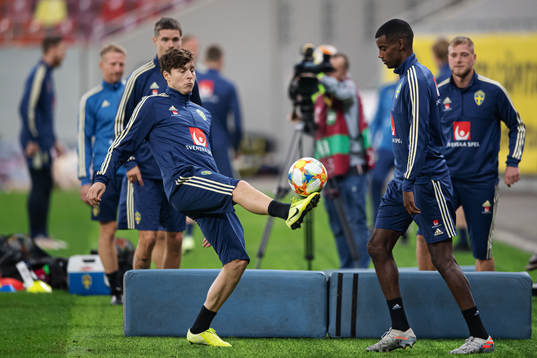 Victor Nilsson Lindelöf and Alexander Isak of the Swedish
