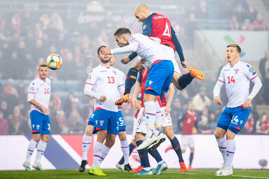 Tore Reginiussen of Norway scores 1-0