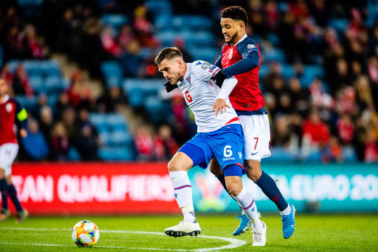 Heini Vatnsdal of Faroe Islands and Joshua Christian Kojo