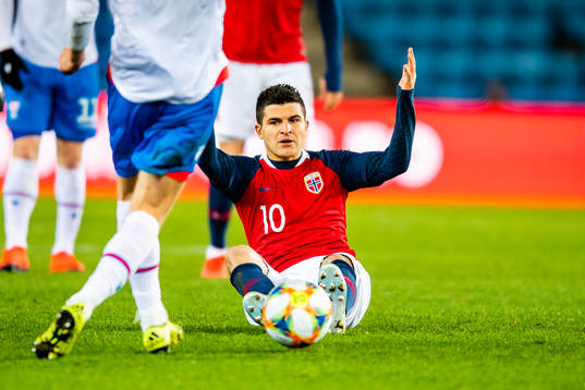 Tarik Elyounoussi of Norway looks dejected