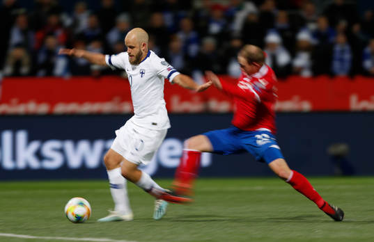 Teemu Pukki #10, FIN and Martin Rechsteiner #22, LIE