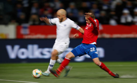 Teemu Pukki #10, FIN and Martin Rechsteiner #22, LIE
