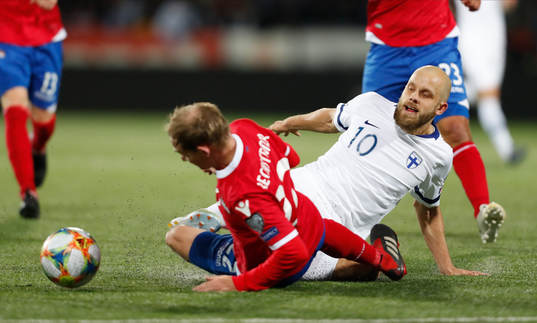 Martin Rechsteiner #22, LIE and Teemu Pukki #10, FIN