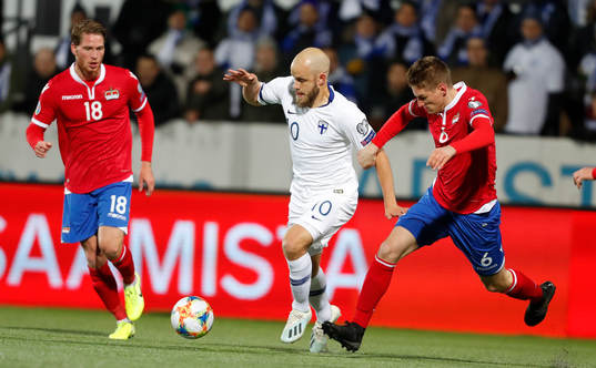 Teemu Pukki #10, FIN and Andreas Malin #6, LIE