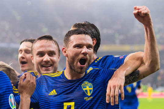 Marcus Berg of Sweden celebrate