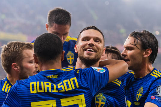 Marcus Berg of Sweden celebrates with team mates