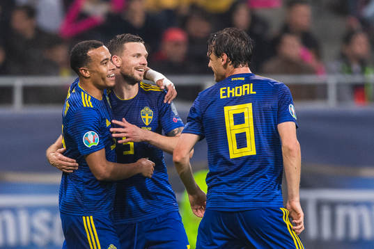 Robin Quaison of Sweden celebrates with Marcus Berg and