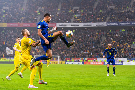 Vasile Mogos of Romania and Robin Quaison of Sweden