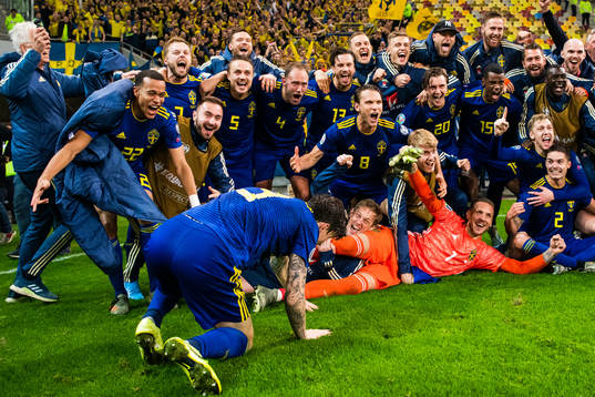 The team of Sweden celebrate