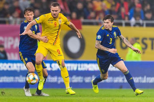 Albin Ekdal of Sweden and George Puscas of Romania compete