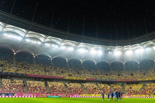 Players of Sweden inspect the pitch