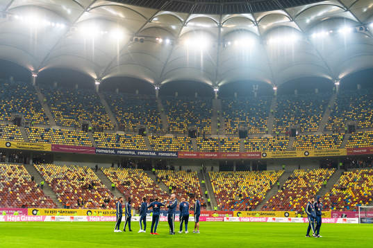 Players of Sweden inspect the pitch