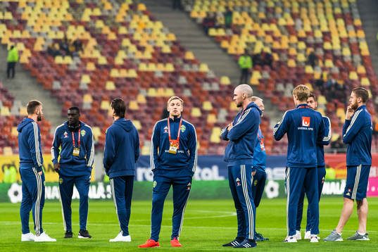 Emil Forsberg and Marcus Danielson of Sweden inspect the