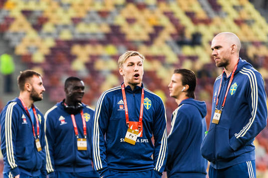 Emil Forsberg and Marcus Danielson of Sweden inspect the