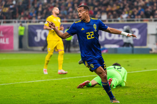 Robin Quaison of Sweden celebrates scoring 0-2