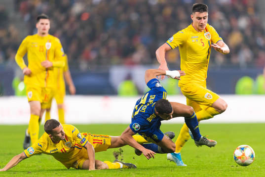 Nicusor Bancu anfd Ionut Nedelcearu of Romania defend