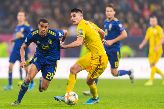 Robin Quaison of Sweden drive by Ionut Nedelcearu of Romania