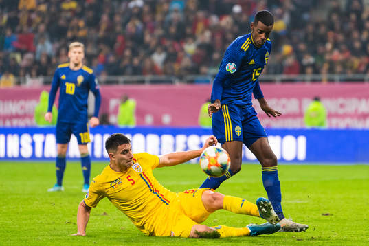 Ionut Nedelcearu of Romania and Alexander Isak of Sweden