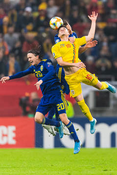 Albin Ekdal and Kristoffer Olsson of Sweden compete for the