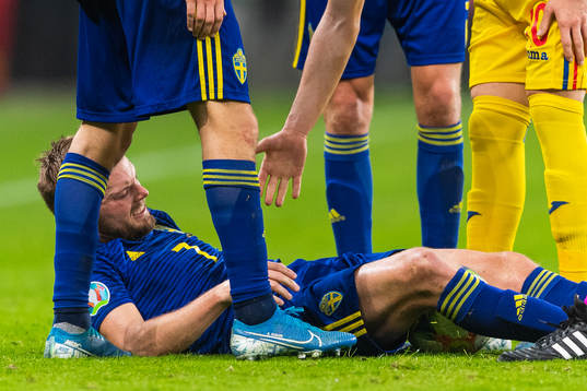 Sebastian Larsson of Sweden lies down