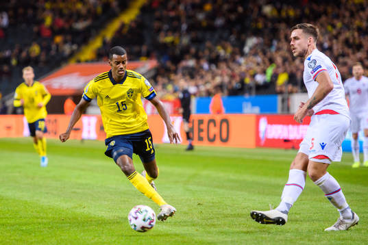 Alexander Isak of Sweden and Heini Vatnsdal of Faroe Islands