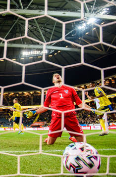 Goalkeeper Gunnar Nielsen of Faroe Islands looks dejected