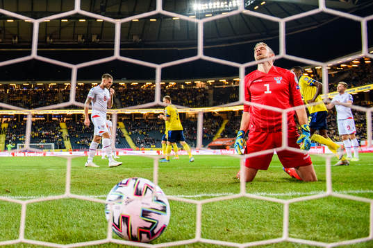 Goalkeeper Gunnar Nielsen of Faroe Islands looks dejected