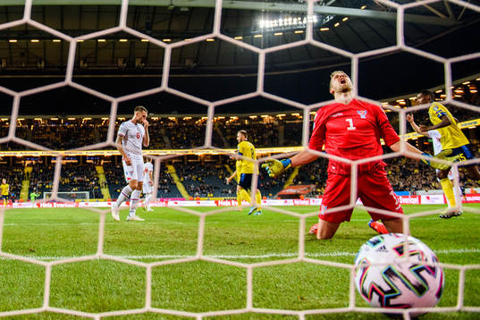 Goalkeeper Gunnar Nielsen of Faroe Islands looks dejected
