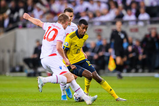 Alexander Isak of Sweden and Brandur Hendriksson Olsen of