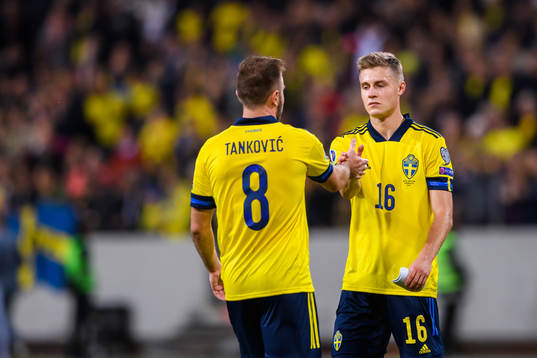 Muamer Tankovic and Mattias Svanberg of Sweden celebrate