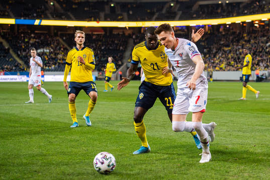 Ken Sema of Sweden and Kaj Leo Bartalsstovu of Faroe Islands