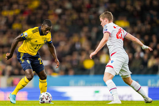 Ken Sema of Sweden and Joannes Bjartalid of Faroe Islands