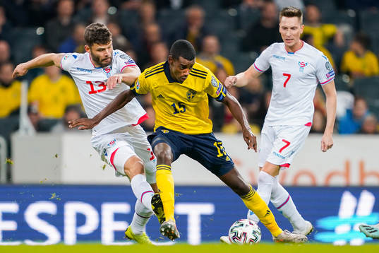 Rogvi Baldvinsson of Faroe Islands in action with Alexander