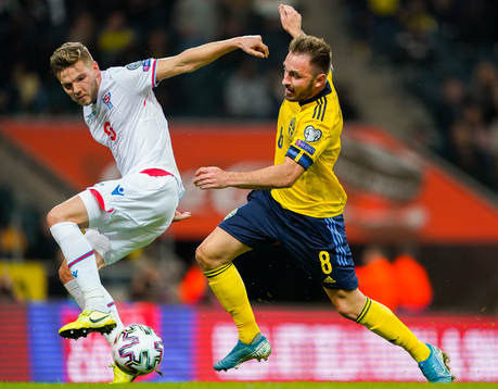 Gilli Rólantsson of Faroe Islands and Muamer Tankovic of