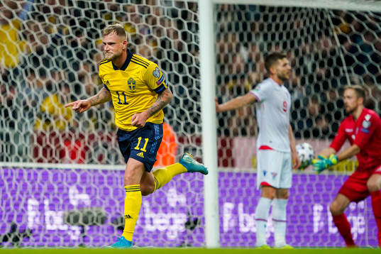 John Guidetti of Sweden celebrates