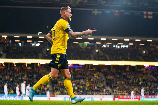 John Guidetti of Sweden celebrates
