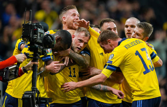John Guidetti of Sweden celebrate with teammates