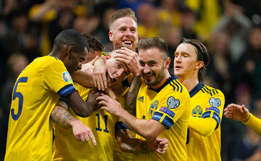 John Guidetti of Sweden celebrate with teammates