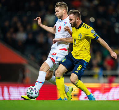 Gilli Rólantsson of Faroe Islands and Muamer Tankovic of