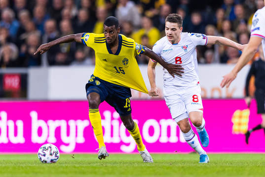 Alexander Isak of Sweden and Brandur Hendriksson Olsen of