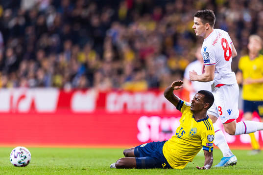 Alexander Isak of Sweden and Brandur Hendriksson Olsen of