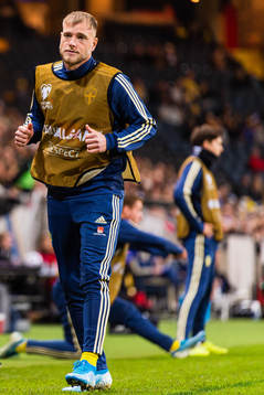 John Guidetti of Sweden warms up