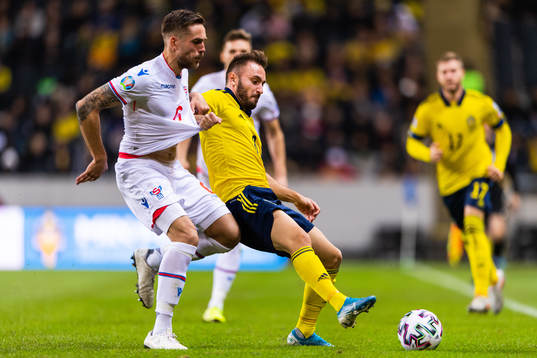 Heini Vatnsdal of Faroe Islands and Muamer Tankovic of